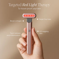 Hand holding a red light therapy device with text on a beige background